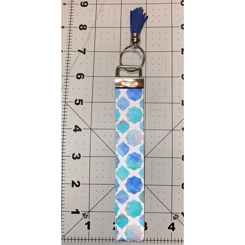 ☀️3/$9☀️ Faux Leather Keychain Wristlet with Dark Blue Tassel